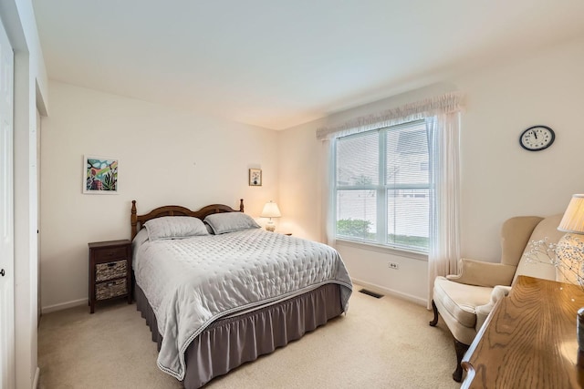 1232 Sumac Trl, Hoffman Estates, IL 60192 - bedroom with light carpet and baseboards