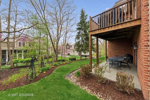 21819 W Riviera Ct, Mundelein, IL 60060 - view of grassy yard featuring a patio and a wooden deck