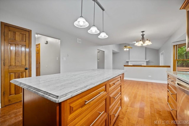 2556 Leach Dr, Naperville, IL 60564 - kitchen featuring a chandelier, dishwasher, light wood-type flooring, vaulted ceiling, and a fireplace