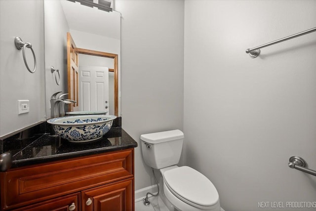 2556 Leach Dr, Naperville, IL 60564 - half bathroom featuring toilet, vanity, baseboards, and marble finish floors