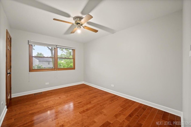 2556 Leach Dr, Naperville, IL 60564 - unfurnished room with baseboards, light wood-style floors, and a ceiling fan