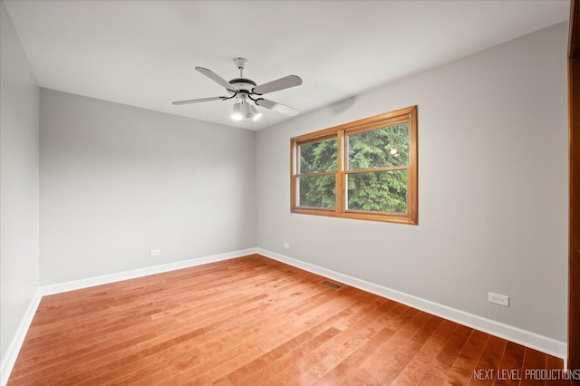 2556 Leach Dr, Naperville, IL 60564 - unfurnished room featuring light wood-type flooring, baseboards, and a ceiling fan