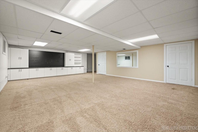 2556 Leach Dr, Naperville, IL 60564 - finished below grade area with a paneled ceiling, carpet, and baseboards