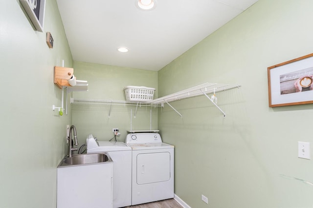 2715 Lahinch Dr, Aurora, IL 60503 - laundry room featuring washing machine and dryer, recessed lighting, and light wood finished floors