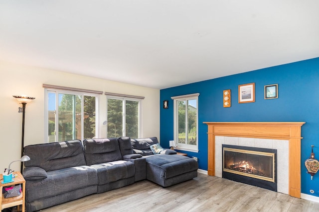 2715 Lahinch Dr, Aurora, IL 60503 - living area featuring wood finished floors and a fireplace