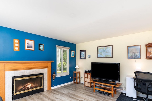 2715 Lahinch Dr, Aurora, IL 60503 - living room with wood finished floors and a tiled fireplace