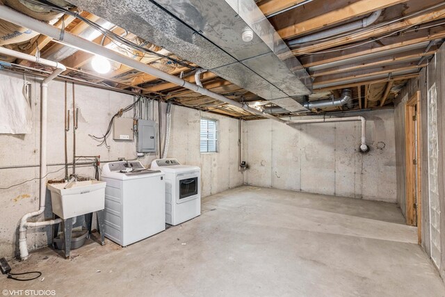 907 Mary Byrne Dr, Sauk Village, IL 60411 - basement with electric panel, washer and clothes dryer, and a sink