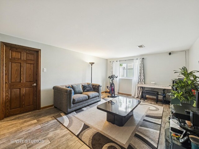 2136 N Westmoreland Dr, Palatine, IL 60074 - living room with light wood-type flooring and baseboards