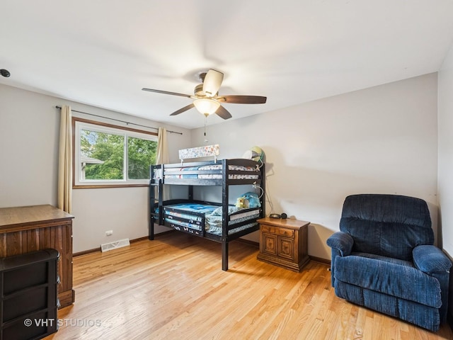 2136 N Westmoreland Dr, Palatine, IL 60074 - bedroom with light wood finished floors and ceiling fan