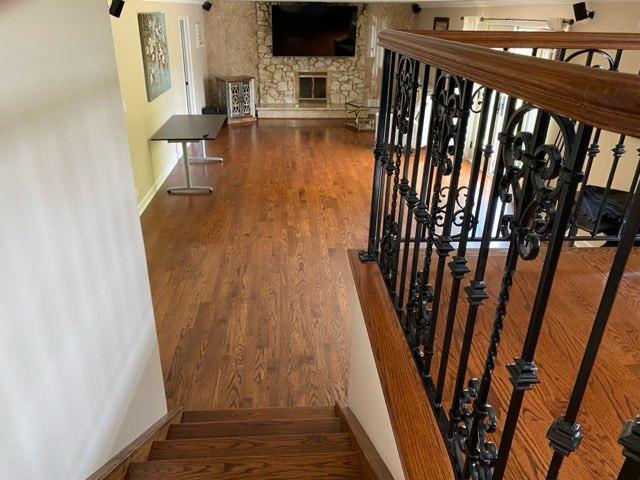 473 S Edgewood Ave, Wood Dale, IL 60191 - stairs featuring baseboards, wood finished floors, and a fireplace