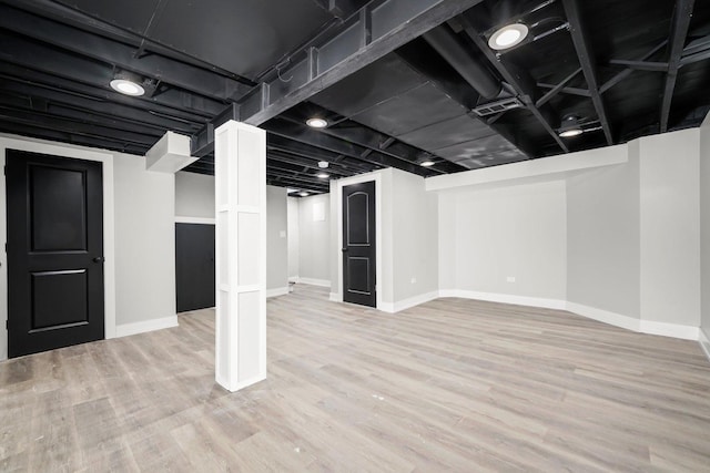 9012 S Harper Ave, Chicago, IL 60619 - finished basement featuring baseboards and wood finished floors
