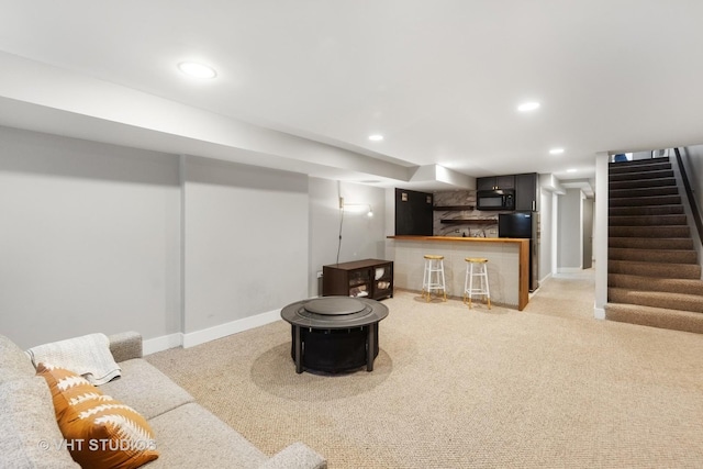 3342 S Giles Ave, Chicago, IL 60616 - living room with stairs, light colored carpet, bar, baseboards, and recessed lighting