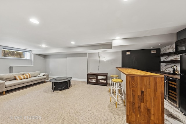 3342 S Giles Ave, Chicago, IL 60616 - carpeted living room featuring bar with sink, beverage cooler, and recessed lighting