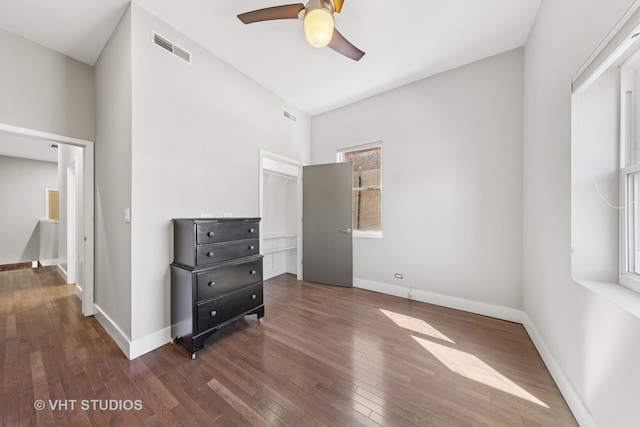 3342 S Giles Ave, Chicago, IL 60616 - unfurnished bedroom featuring hardwood / wood-style floors, baseboards, and a ceiling fan