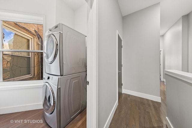 3342 S Giles Ave, Chicago, IL 60616 - washroom with estacked washer and dryer, wood finished floors, and baseboards