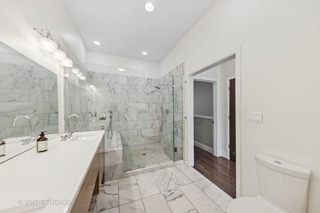 3342 S Giles Ave, Chicago, IL 60616 - bathroom featuring marble look tile flooring, vanity, toilet, a shower stall, and recessed lighting