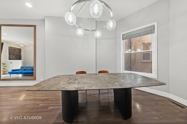 3342 S Giles Ave, Chicago, IL 60616 - unfurnished dining area featuring wood finished floors, baseboards, and recessed lighting