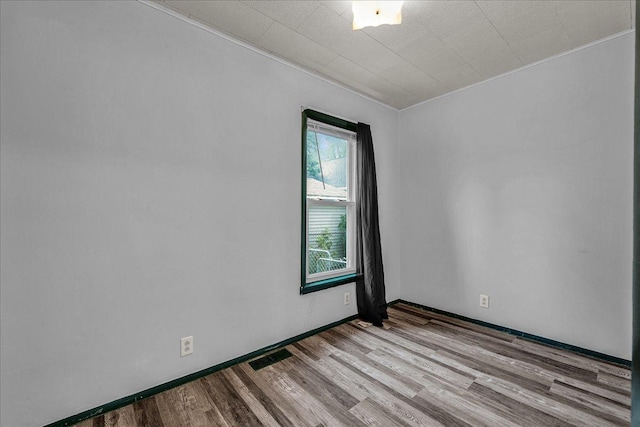 913 N Mason St, Bloomington, IL 61701 - empty room featuring wood finished floors