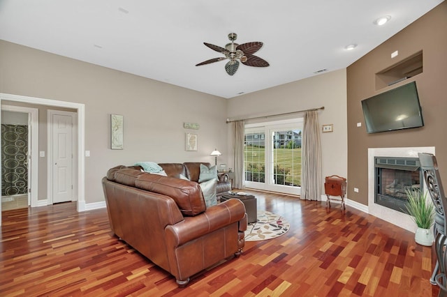 16002 S Stonewall Dr, Newark, IL 60541 - living room featuring wood finished floors, a ceiling fan, and a fireplace