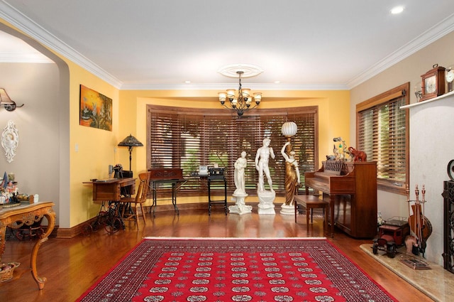 1902 N 77th Ct, Elmwood Park, IL 60707 - sitting room featuring wood finished floors, a chandelier, crown molding, and arched walkways