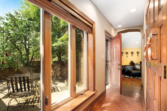 1902 N 77th Ct, Elmwood Park, IL 60707 - doorway to outside featuring arched walkways, wood finished floors, and recessed lighting