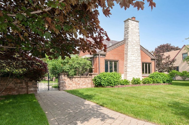 1902 N 77th Ct, Elmwood Park, IL 60707 - view of green lawn featuring a gate