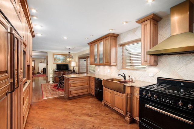 1902 N 77th Ct, Elmwood Park, IL 60707 - kitchen featuring wall chimney exhaust hood, black appliances, light wood-type flooring, ornamental molding, and tasteful backsplash