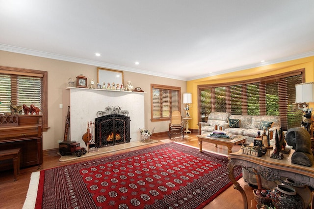 1902 N 77th Ct, Elmwood Park, IL 60707 - living area featuring wood finished floors, a warm lit fireplace, ornamental molding, and recessed lighting