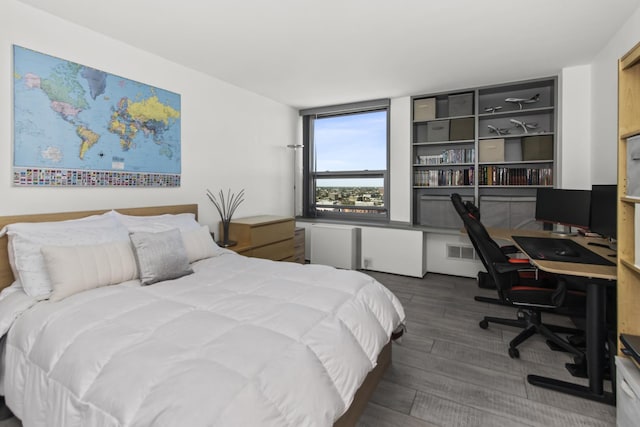 1255 N Sandburg Ter Unit 2912, Chicago, IL 60610 - bedroom with wood finished floors and an office area