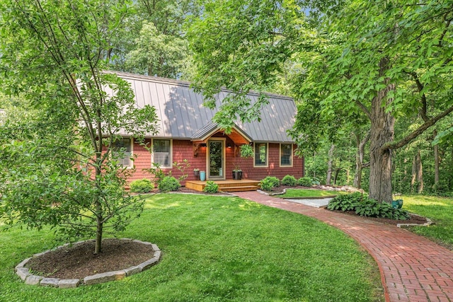 2804 E Concord Rd, Urbana, IL 61802 - view of front facade featuring a front yard and a metal roof