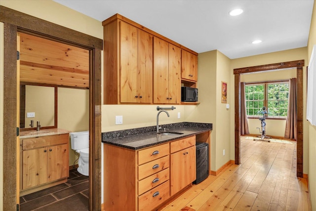 2804 E Concord Rd, Urbana, IL 61802 - kitchen featuring black microwave, dark stone countertops, and recessed lighting