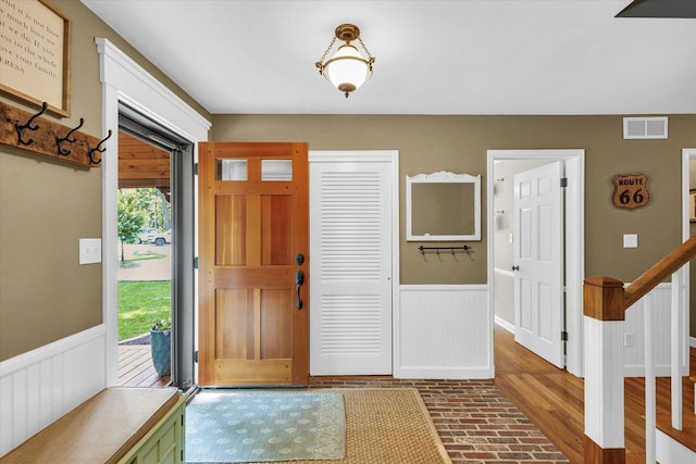 2804 E Concord Rd, Urbana, IL 61802 - foyer with wainscoting and brick patterned floors