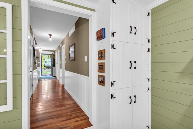 2804 E Concord Rd, Urbana, IL 61802 - corridor with wood finished floors, wood walls, and a wainscoted wall