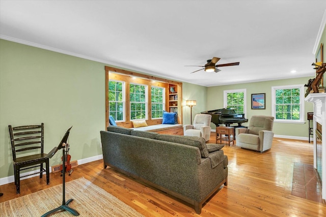 2804 E Concord Rd, Urbana, IL 61802 - living area with a ceiling fan, a fireplace, light wood-style floors, crown molding, and recessed lighting