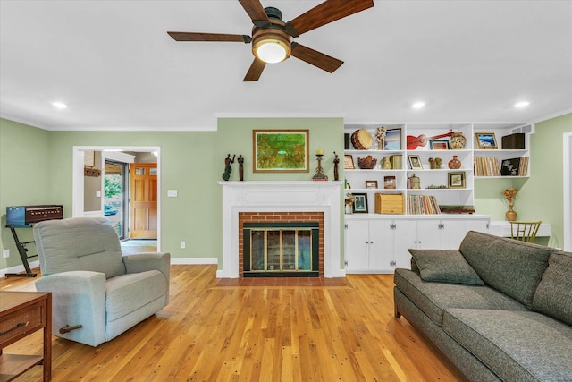 2804 E Concord Rd, Urbana, IL 61802 - living area featuring ornamental molding, a ceiling fan, wood finished floors, recessed lighting, and a fireplace