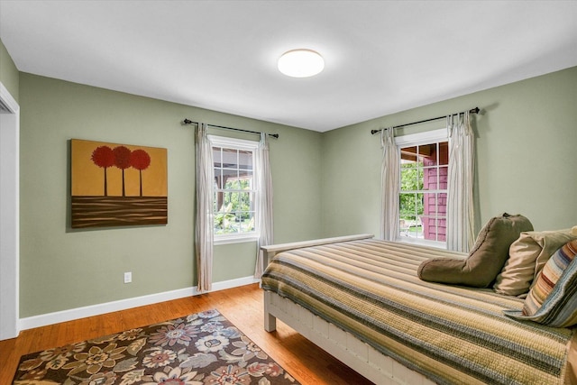 2804 E Concord Rd, Urbana, IL 61802 - bedroom featuring multiple windows and light wood finished floors