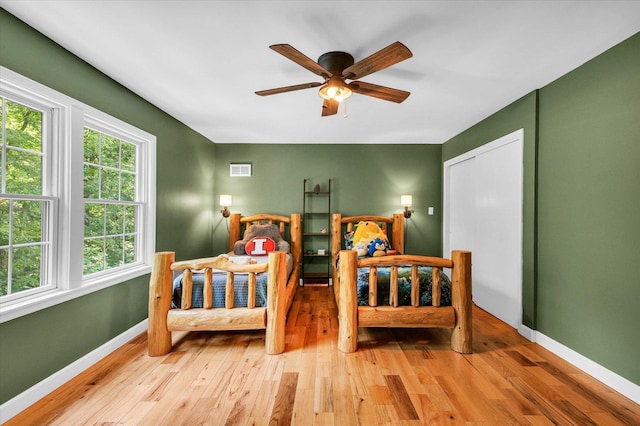 2804 E Concord Rd, Urbana, IL 61802 - bedroom featuring wood-type flooring and ceiling fan