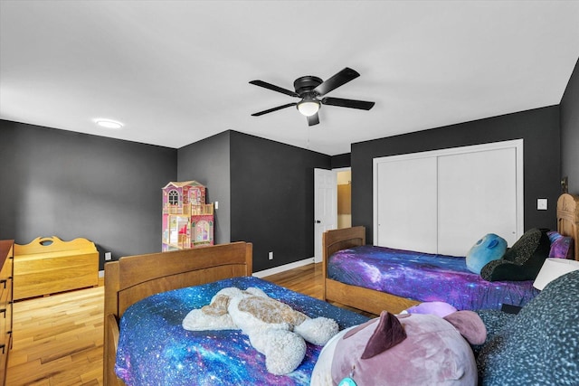 2804 E Concord Rd, Urbana, IL 61802 - bedroom featuring wood finished floors, a closet, and ceiling fan