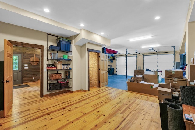 2804 E Concord Rd, Urbana, IL 61802 - below grade area with light wood-style floors, a garage, and recessed lighting