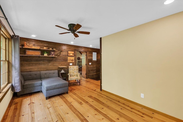 2804 E Concord Rd, Urbana, IL 61802 - living room with wooden walls, light wood-style flooring, recessed lighting, and a ceiling fan