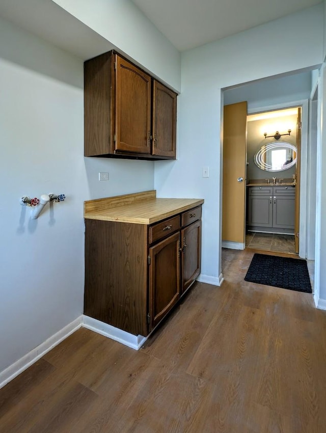 235 E Manchester Dr, Wheeling, IL 60090 - kitchen featuring dark wood-style flooring and light countertops