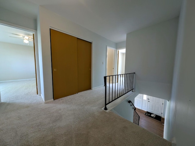 235 E Manchester Dr, Wheeling, IL 60090 - hallway featuring an upstairs landing and carpet flooring