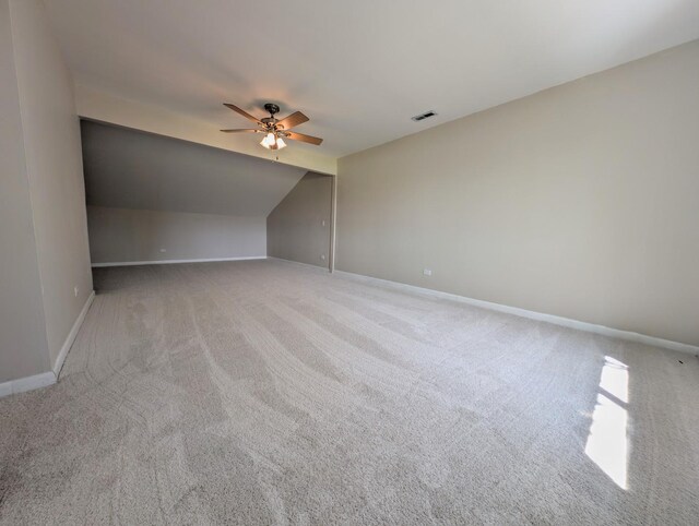 235 E Manchester Dr, Wheeling, IL 60090 - additional living space with ceiling fan, carpet flooring, and lofted ceiling