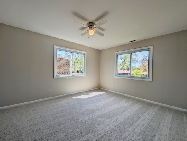 235 E Manchester Dr, Wheeling, IL 60090 - carpeted spare room with ceiling fan and baseboards