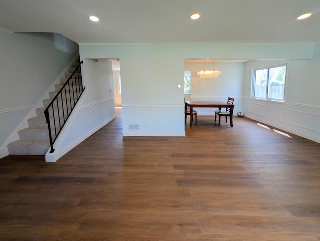 235 E Manchester Dr, Wheeling, IL 60090 - dining area featuring stairs, a chandelier, ornamental molding, recessed lighting, and wood finished floors