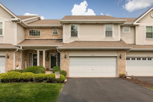 9215 Waterfall Glen Blvd, Darien, IL 60561 - multi unit property with driveway, a garage, and roof with shingles