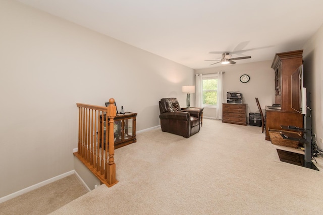 9215 Waterfall Glen Blvd, Darien, IL 60561 - sitting room with carpet, an upstairs landing, a ceiling fan, and baseboards
