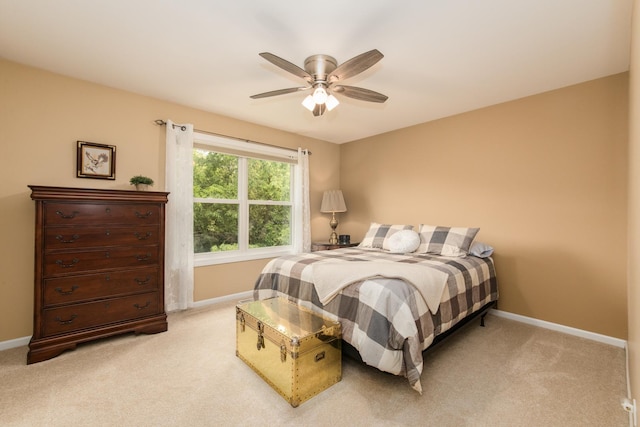 9215 Waterfall Glen Blvd, Darien, IL 60561 - bedroom with baseboards, light carpet, and ceiling fan