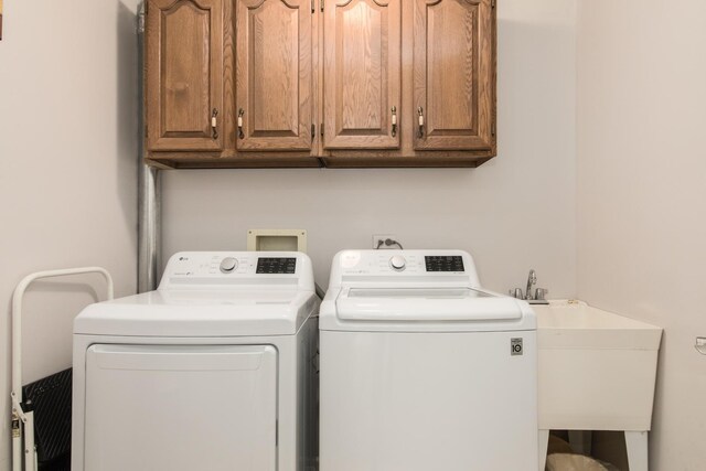 9215 Waterfall Glen Blvd, Darien, IL 60561 - washroom featuring washer and dryer and cabinet space