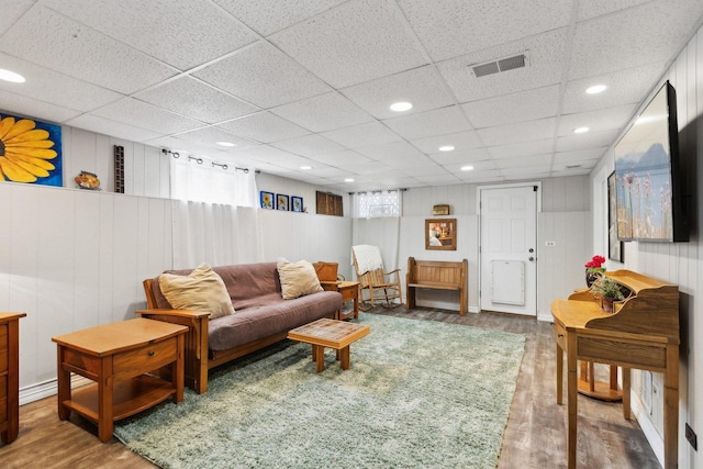 1424 Glencoe Ave, Highland Park, IL 60035 - living room featuring wood finished floors, recessed lighting, and a drop ceiling